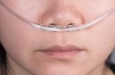 Oxygen mask on woman's face