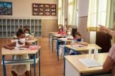 students in classroom wearing masks