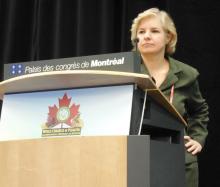 Dr. Karen F. Murray speaking from the podium at the World Congress of Pediatric Gastroenterology, Hepatology, and Nutrition