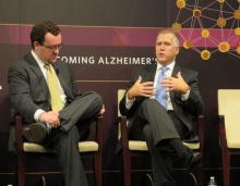 Reid Wilson (left), national correspondent for The Hill, speaks about Alzheimer's research funding with Sen. Thom Tillis.