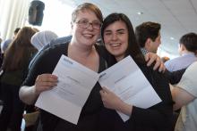 Chelsea Dahl, left, who matched to the University of Pittsburgh Medical Center, shares the moment with Neyra Azimov, who matched to Winthrop (preliminary) for Medicine and New York Presbyterian Hospital/Columbia University Medical Center.