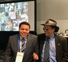 Joseph Calhoun, whom Dr. Carl C. Bell mentored through the APA’s Black Men in Psychiatry Early Pipeline Program, laughs with him following his Adolph Meyer Award Memorial Lecture at the 2019 APA meeting in San Francisco.