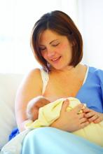 Mother breastfeeding her child.