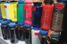 Shelves of polycarbonate plastic bottles