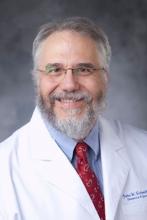 Dr. John W. Schmitt, professor of obstetrics and gynecology at Duke University