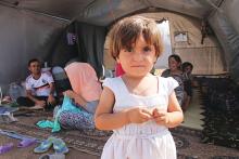 Refugee children are shown in a Syrian refugee camp in Al-Hassakah province.