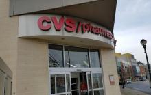 a photo of the front of a CVS pharmacy, showing its logo/name.