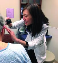 Jennifer Choi, MD, chief of the division of oncodermatology at the Robert H. Lurie Comprehensive Cancer Center of Northwestern University, Chicago, is shown with a patient