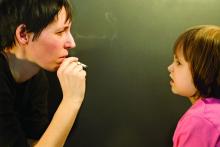 smoking parent with child