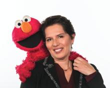 Dr. Jeanette Betancourt with Elmo