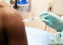 A patient in the Phase I trial of the the investigational NIAID/GlaxoSmithKline (GSK) Ebola vaccine. The photograph was captured at the National Institutes of Health Clinical Center in Bethesda, Md.