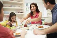 Children's obesity risk decreases if the family enjoys happy family meals together.