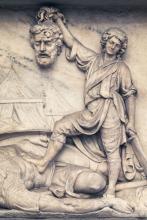 Sculpture shows David holding Goliath's head