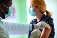 woman getting vaccine