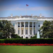 A picture of the front of the White House.