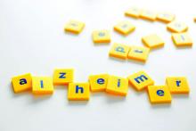 letter tiles spell the word Alzheimer