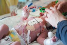 Mother and son in the neonatal intensive care unit