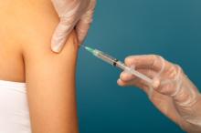 A flu shot is administered