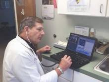 Family physician Dr. Russell Thomas of Eagle Lake, Tex. recently started using telemedicine to treat distant patients.