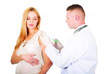 Pregnant woman being vaccinated